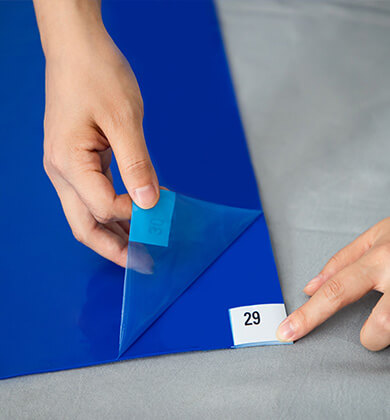 sticky mats being lifted up